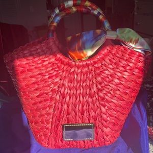 Beautiful red Ted Baker silk lined red straw bag.